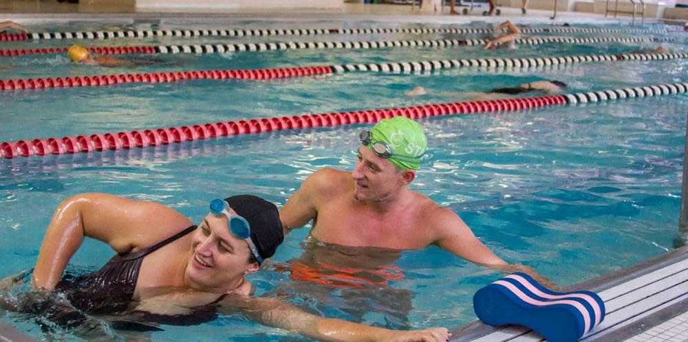 Adults in a swim class